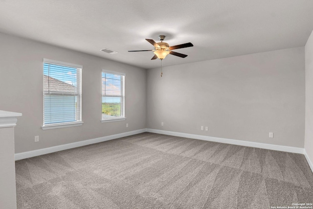 6538 Scooby Acres, San Antonio, TX 78108 - spare room with ceiling fan, carpet flooring, and baseboards