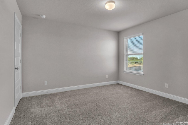 6538 Scooby Acres, San Antonio, TX 78108 - carpeted spare room featuring baseboards