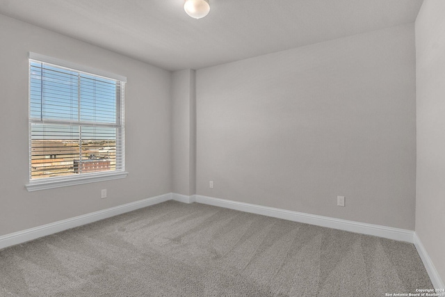 6538 Scooby Acres, San Antonio, TX 78108 - carpeted spare room featuring plenty of natural light and baseboards