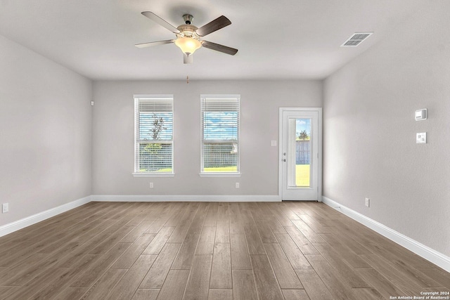 6538 Scooby Acres, San Antonio, TX 78108 - empty room featuring wood finished floors, ceiling fan, and baseboards
