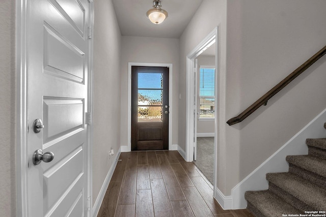6538 Scooby Acres, San Antonio, TX 78108 - entrance foyer with baseboards, dark wood-type flooring, and stairway