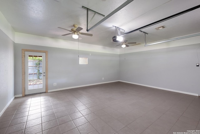 123 Serene Creek Ln, Mcqueeney, TX 78123 - unfurnished room featuring a ceiling fan, baseboards, and dark tile patterned flooring