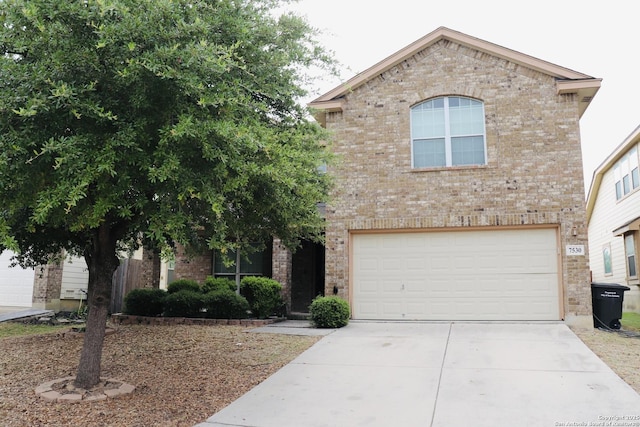 7530 Elegante Way, San Antonio, TX 78266 - view of front of house with an attached garage, brick siding, and concrete driveway