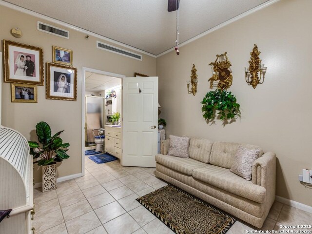 1 Towers Park Unit 1813, San Antonio, TX 78209 - living area featuring crown molding, light tile patterned floors, and baseboards