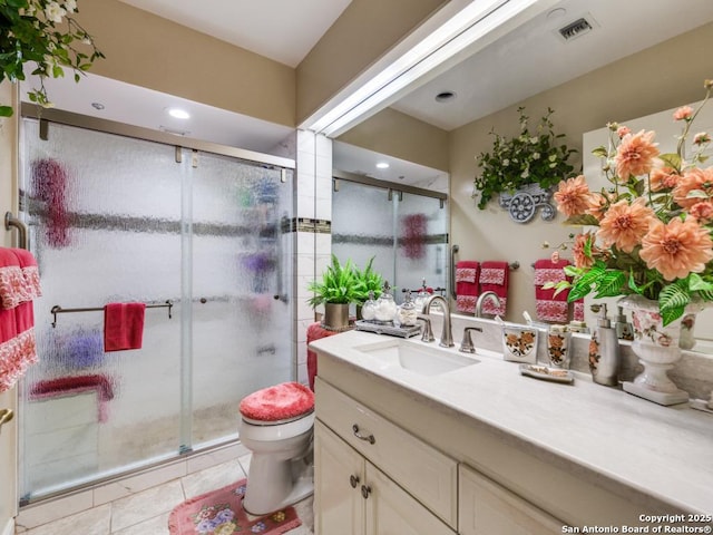 1 Towers Park Unit 1813, San Antonio, TX 78209 - bathroom featuring vanity, toilet, tile patterned floors, and a stall shower