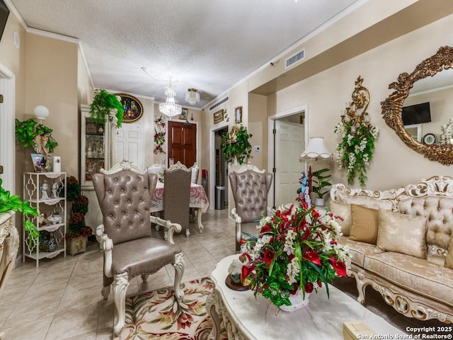 1 Towers Park Unit 1813, San Antonio, TX 78209 - living area featuring ornamental molding, a chandelier, light tile patterned flooring, and a textured ceiling