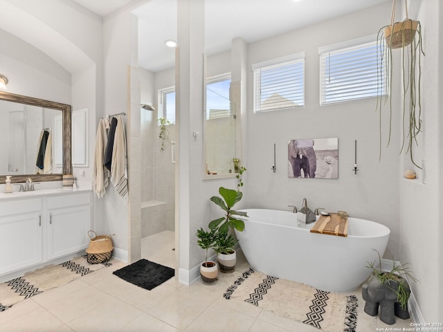 4508 River Rock, Marion, TX 78124 - full bathroom with vanity, plenty of natural light, a freestanding bath, and a walk in shower