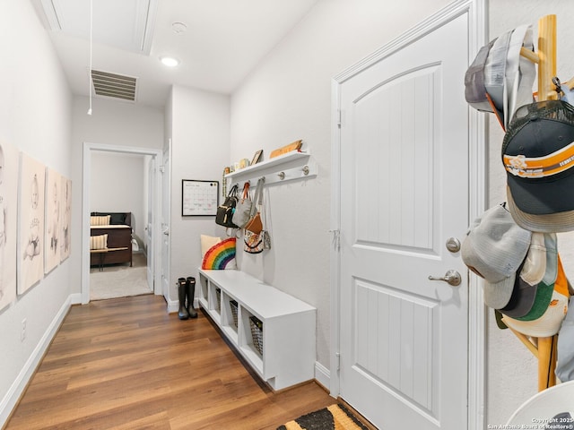 4508 River Rock, Marion, TX 78124 - mudroom with attic access, light wood finished floors, baseboards, and recessed lighting