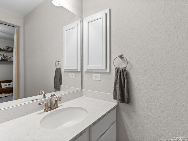 4508 River Rock, Marion, TX 78124 - bathroom featuring vanity and a textured wall