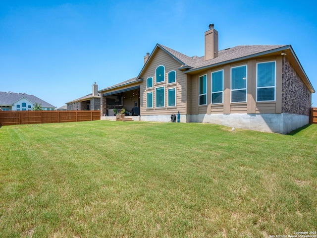 4508 River Rock, Marion, TX 78124 - rear view of property with a chimney