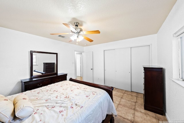 9014 Camino Rey, San Antonio, TX 78245 - bedroom featuring a closet and a ceiling fan
