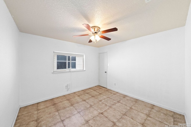 9014 Camino Rey, San Antonio, TX 78245 - unfurnished room featuring a ceiling fan, a textured ceiling, and baseboards