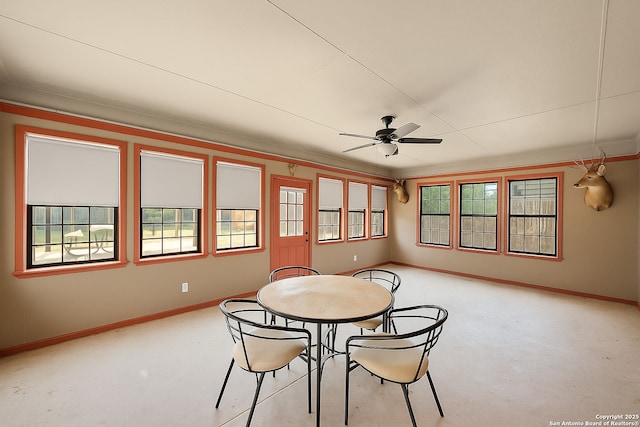 9014 Camino Rey, San Antonio, TX 78245 - dining room featuring ceiling fan, baseboards, and ornamental molding