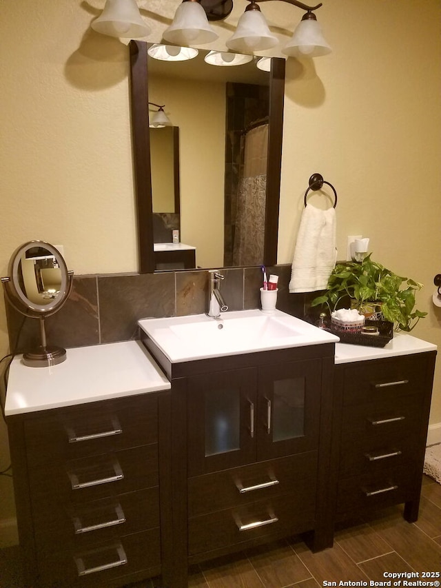 218 E Antonio, Uvalde, TX 78801 - bathroom with vanity and wood tiled floors