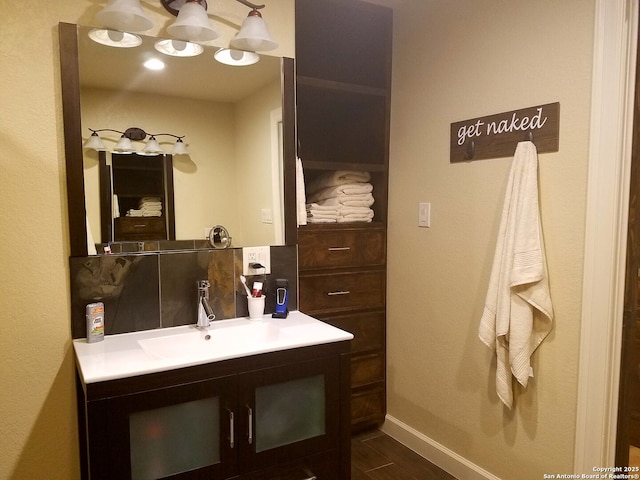 218 E Antonio, Uvalde, TX 78801 - bathroom with vanity and baseboards