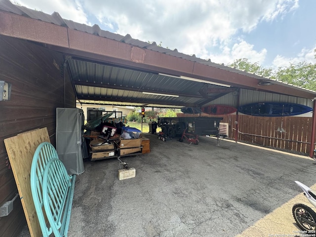 218 E Antonio, Uvalde, TX 78801 - view of parking featuring a carport