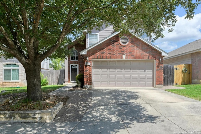 6039 Woodway Ct, San Antonio, TX 78249 - traditional-style home featuring brick siding, driveway, and a garage