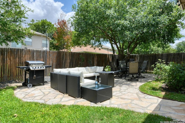 6039 Woodway Ct, San Antonio, TX 78249 - fenced backyard with grilling area, an outdoor living space, a patio, and outdoor dining space