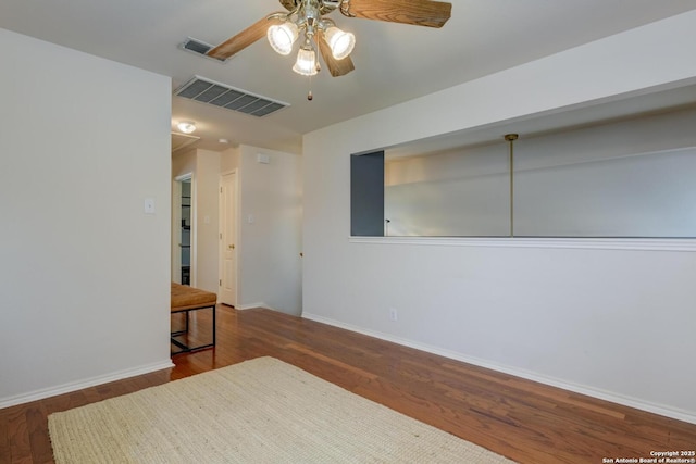 6039 Woodway Ct, San Antonio, TX 78249 - bedroom featuring baseboards, wood finished floors, and a ceiling fan