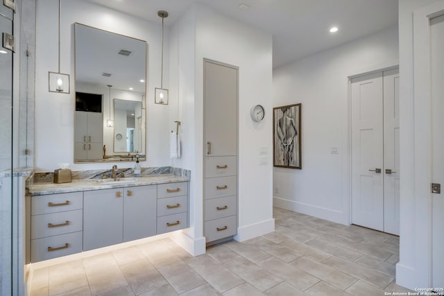 121 Greystone Pt, Boerne, TX 78006 - full bathroom featuring vanity, baseboards, and recessed lighting