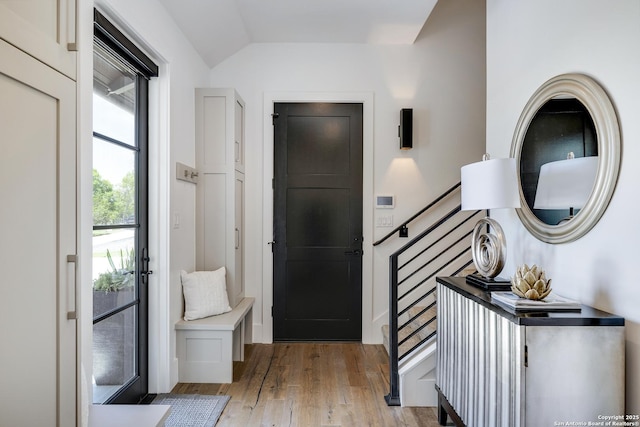 121 Greystone Pt, Boerne, TX 78006 - entrance foyer with stairway, light wood-style flooring, and vaulted ceiling