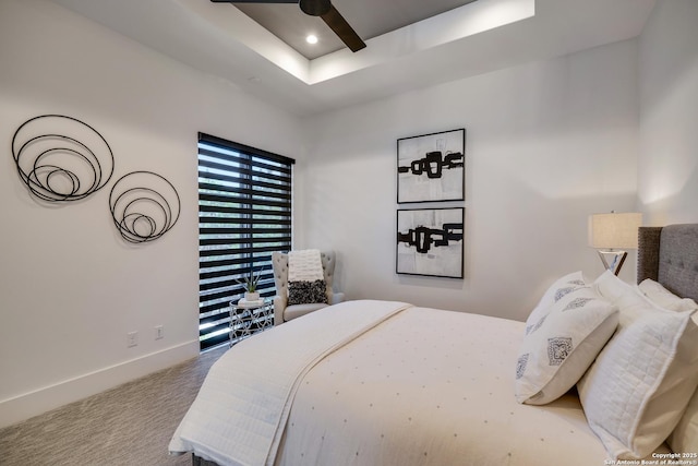 121 Greystone Pt, Boerne, TX 78006 - carpeted bedroom featuring baseboards, a raised ceiling, a ceiling fan, and recessed lighting