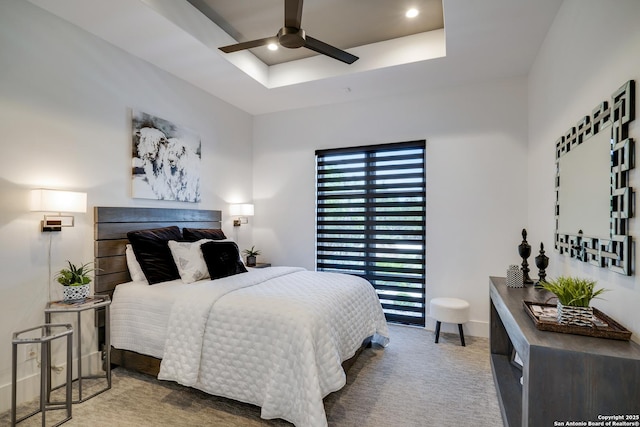 121 Greystone Pt, Boerne, TX 78006 - carpeted bedroom with a raised ceiling, recessed lighting, and ceiling fan