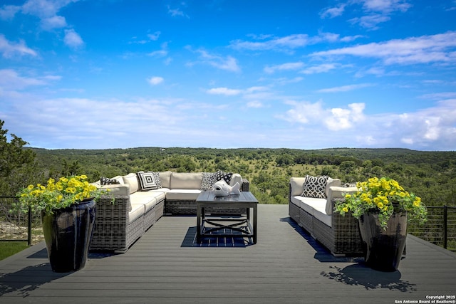 121 Greystone Pt, Boerne, TX 78006 - wooden terrace with an outdoor living space and a wooded view