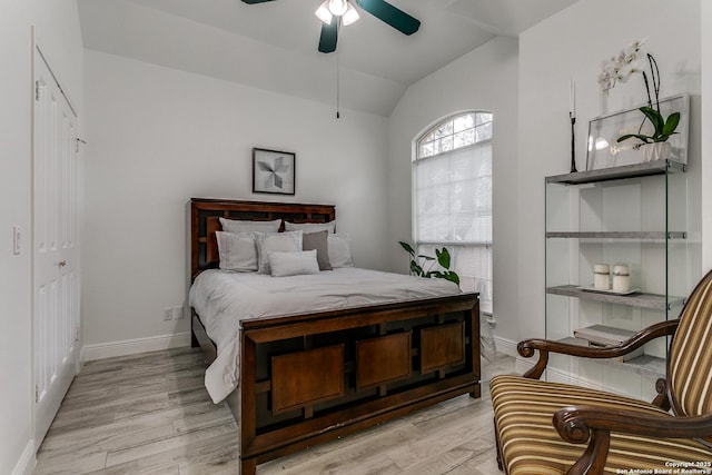 18210 Crystal Ridge Dr, San Antonio, TX 78259 - bedroom with vaulted ceiling, baseboards, light wood finished floors, and a ceiling fan