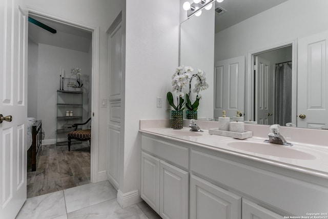 18210 Crystal Ridge Dr, San Antonio, TX 78259 - full bathroom with double vanity and baseboards