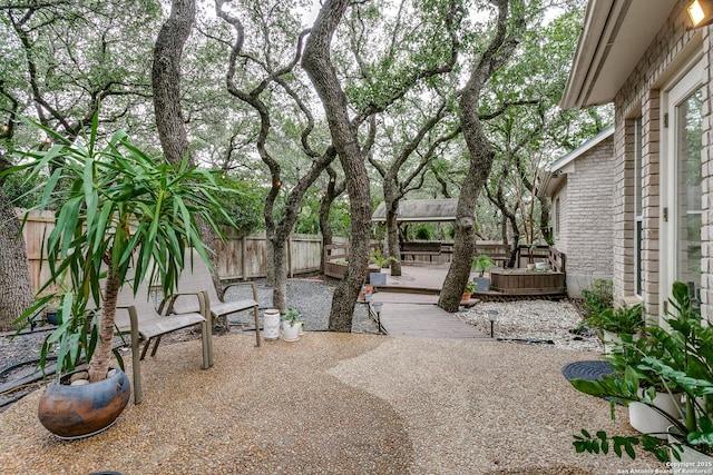 18210 Crystal Ridge Dr, San Antonio, TX 78259 - fenced backyard with a patio area and a wooden deck