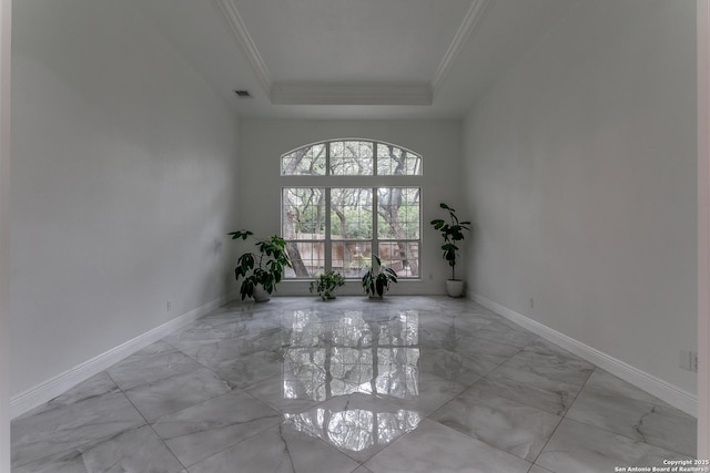 18210 Crystal Ridge Dr, San Antonio, TX 78259 - empty room with marble finish flooring, a tray ceiling, crown molding, and baseboards