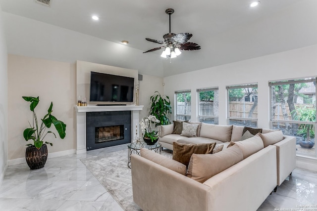 18210 Crystal Ridge Dr, San Antonio, TX 78259 - living area with light marble finish flooring, recessed lighting, ceiling fan, a fireplace, and baseboards