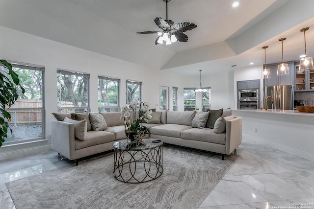 18210 Crystal Ridge Dr, San Antonio, TX 78259 - living room featuring a ceiling fan, light marble finish floors, and recessed lighting