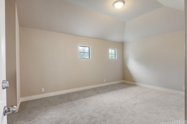 27711 Woodway Bnd, Boerne, TX 78006 - spare room featuring carpet floors and vaulted ceiling