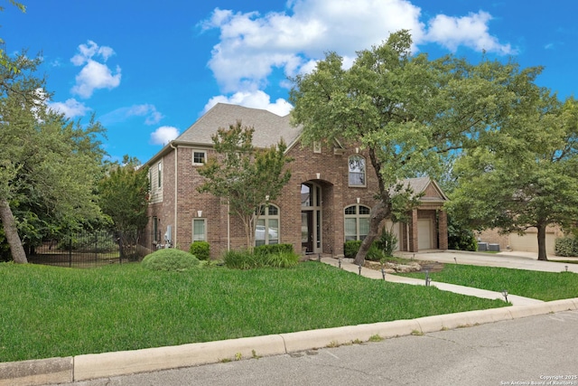 27711 Woodway Bnd, Boerne, TX 78006 - view of front of house featuring brick siding, driveway, and a garage