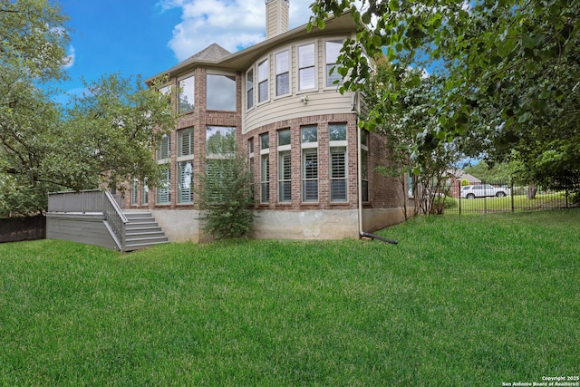 27711 Woodway Bnd, Boerne, TX 78006 - back of property with a chimney and brick siding