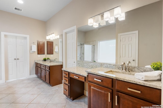 27711 Woodway Bnd, Boerne, TX 78006 - bathroom featuring a shower stall, tile patterned floors, and two vanities