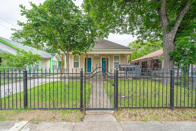2310 W Houston St, San Antonio, TX 78207 - view of front of home featuring covered porch, a gate, and a shingled roof