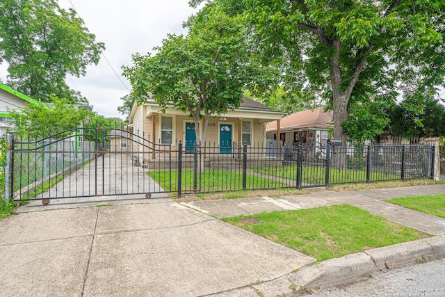 2310 W Houston St, San Antonio, TX 78207 - view of front facade with a porch and a gate