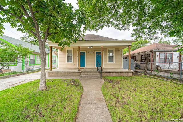 2310 W Houston St, San Antonio, TX 78207 - view of front of property featuring a porch and roof with shingles