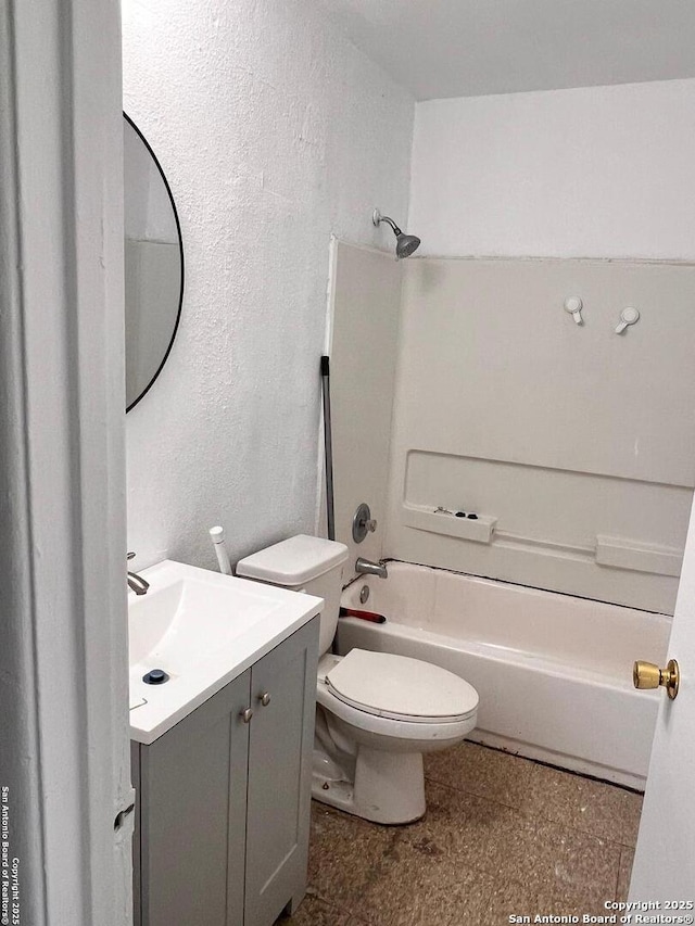 115 Westhaven Pl, San Antonio, TX 78227 - bathroom featuring shower / bathtub combination, vanity, toilet, and a textured wall