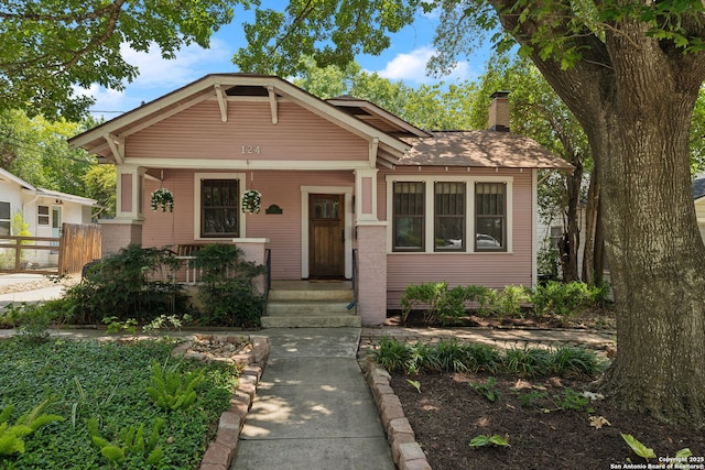 124 Corona, Alamo Heights, TX 78209 - view of front of home featuring a chimney and covered porch