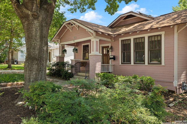 124 Corona, Alamo Heights, TX 78209 - view of front of property with a porch and roof with shingles