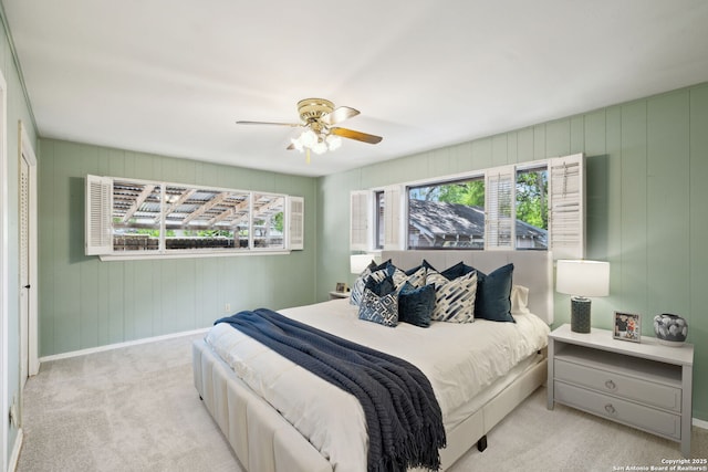 124 Corona, Alamo Heights, TX 78209 - bedroom featuring multiple windows, carpet, baseboards, and a ceiling fan