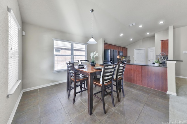 5327 Gemsbuck Chase, San Antonio, TX 78251 - dining room with vaulted ceiling, recessed lighting, baseboards, and light tile patterned floors