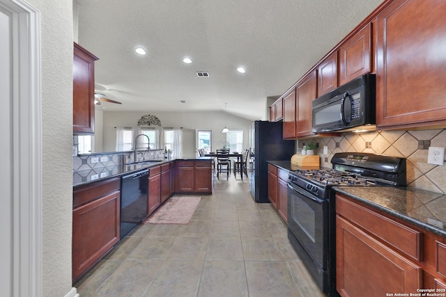 5327 Gemsbuck Chase, San Antonio, TX 78251 - kitchen featuring black appliances, a sink, dark countertops, a peninsula, and decorative backsplash