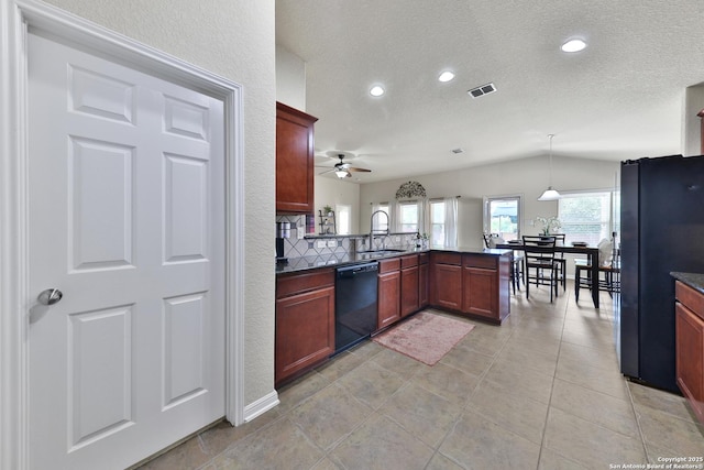 5327 Gemsbuck Chase, San Antonio, TX 78251 - kitchen with black appliances, a ceiling fan, a peninsula, dark countertops, and a sink