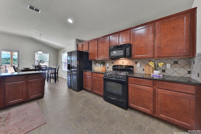 5327 Gemsbuck Chase, San Antonio, TX 78251 - kitchen with black appliances, vaulted ceiling, tasteful backsplash, hanging light fixtures, and dark stone countertops