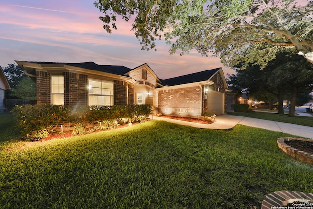 5327 Gemsbuck Chase, San Antonio, TX 78251 - single story home with brick siding, a yard, concrete driveway, and an attached garage